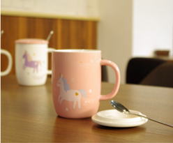 unicorn ceramic cup with cap and spoon..