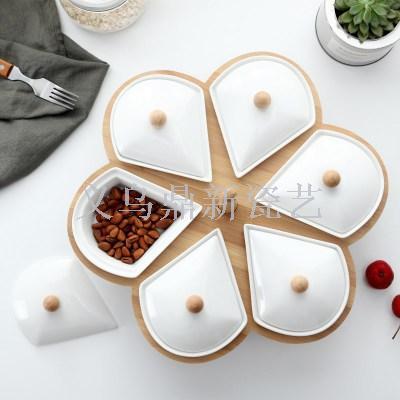 The new multi - lattice rotatable fruit tray creative ceramic with a dried fruit tray with a dried fruit tray.