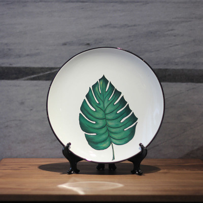 Modern simple ceramic plate hanging plate decorated with bamboo leaves.