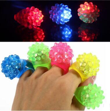 Strawberry fluorescence ring glitter strawberry silicone soft glue ring finger lamp.