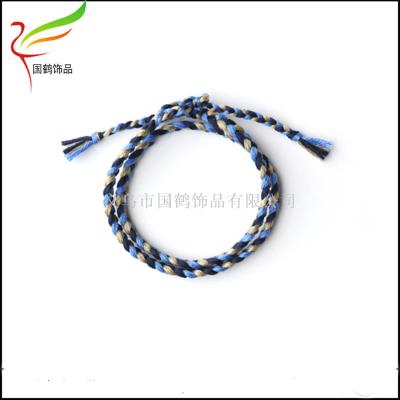 Multi-loop hand-woven cotton cord hand rope.