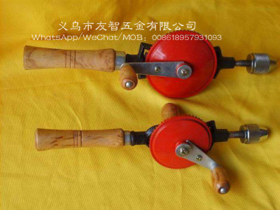 1/4 inch 3/8 inch wooden handle with a hand drill.