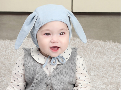 Korean spring and autumn new baby warm hat boys and girls go out with fashionable dog monochromatic hat wholesale