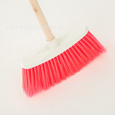 Curved broom brush head with plastic brush.