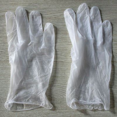 Disposable PVC gloves transparent, 100 pieces of oil and alkali anti-static household labor protection gloves.