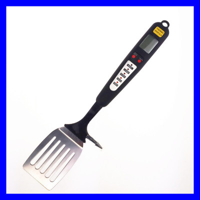 Alarm with a shovel for the barbecue fork.