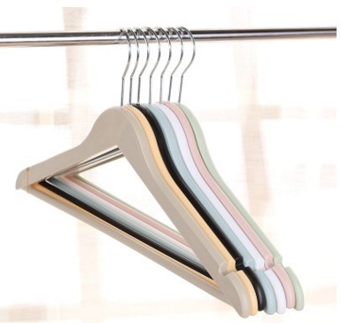 The new clothes rack creative imitation wood plastic pants rack clothing store household towel anti-slip clothes hanger.