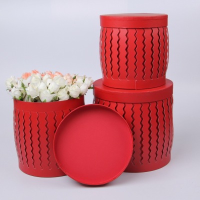 Three - dimensional corrugated hand - by round wedding gift box with round Three - piece flower box holding the bucket bouquet box