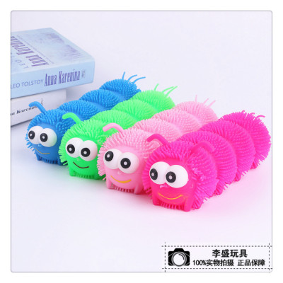A cute caterpillar toy with A shiny ball and A bouncing ball.
