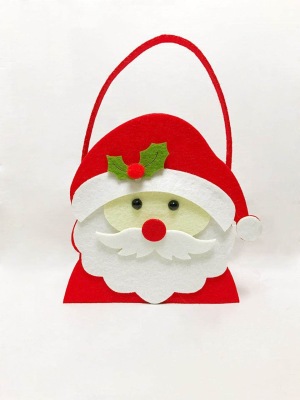 The new Christmas gift brings The apple hand bag across The border and sells creative cartoon non-woven candy bags.