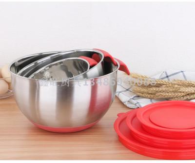 Stainless steel bowl handle with tapered salad bowl with tapered salad bowl silicone bottom.