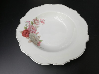 8.5 inch bone China monsoons with small membranous flowers single gold thread/single silver thread.