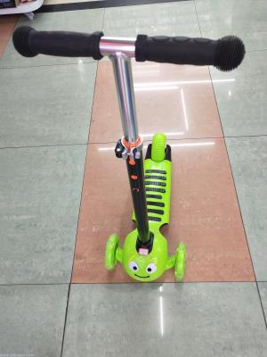 Children's skateboard car with a caterpillar scooter.