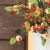 Simulation fruit hand-holding pomegranate fruit garden home decoration floral decoration.
