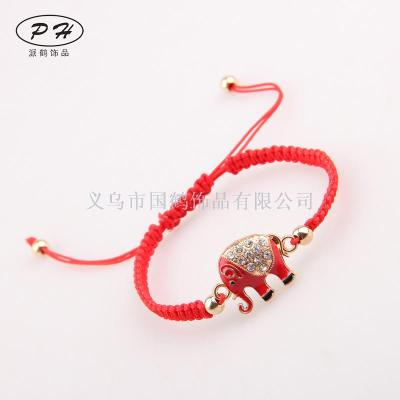 The red rope weaving elephant's bracelet.