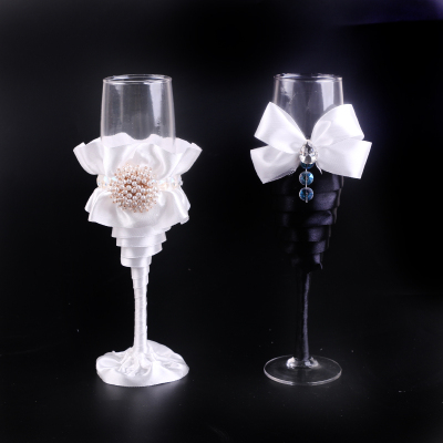 Western-style wedding wine glass wedding knife and fork black and white water drill satin wedding kit.