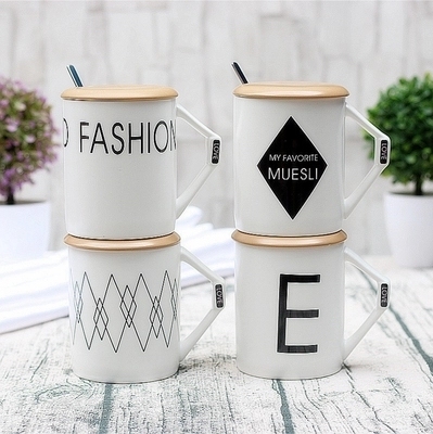Creative personality black and white geometric mark mug with wooden cover stainless steel spoon mark gift .