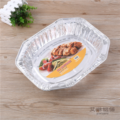Oval - shaped aluminum foil box roasted vegetables with a foil box.