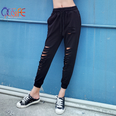 Summer Korean version of the new loose large size women's wear elastic waist sport casual pants hollowed out holes nine point trousers