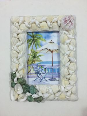 The shell photo frame is exquisite and handmade