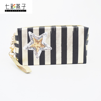 The new star stripe prince bag big capacity lady hand carry make up bag conveniently receive factory direct sale