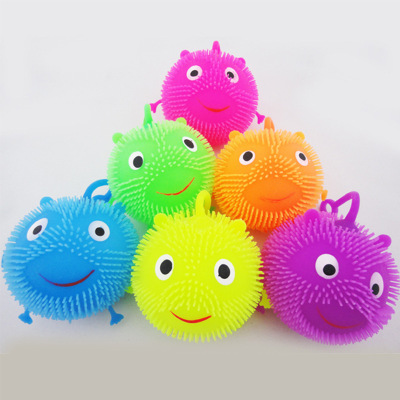 Electronic luminescent children soft rubber toys short hair smiling face hair ball elastic glitter ball manufacturers wholesale