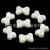Wholesale small bow tie paint plastic beads accessories manufacturers direct selling spot supply good price