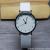 Korean version fashionable new style small fresh simple black shell 1-12 digital leather belt ladies watch student watch