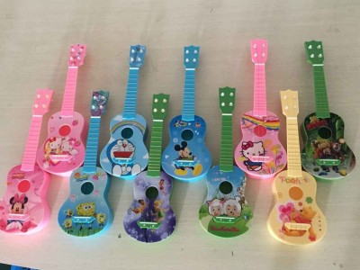 Manufacturers direct 4 string plastic cartoon guitar children's guitar mini guitar early education puzzle Musical Instruments