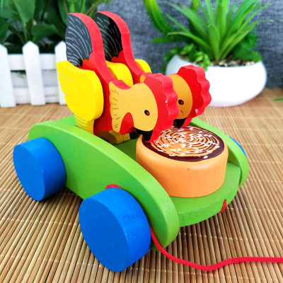 The hot spot sells handicrafts children 's educational toy chickens eat mila car toy chicken peck mila car toy
