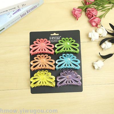 Multi-coloured ponytail claw holder with hair ornament bath pin