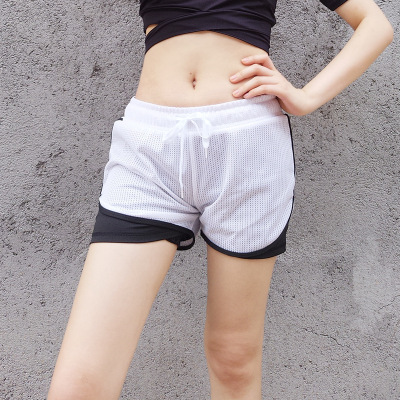 The exposed female loose shorts thin kind of yoga wear outside running speed hot pants in The summer