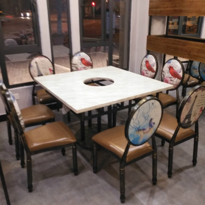 Tables and chairs at quzhou hotpot restaurant