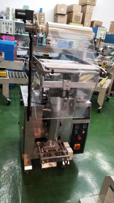 Automatic particle packing machine