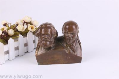 An antique brass western figure, Marx and Lenin