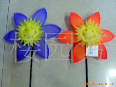 Sunflowers supply windmills. Toy windmills