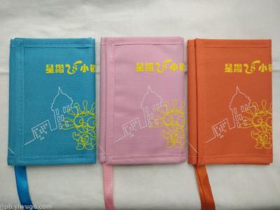 The waterproof 600D polyester fabric material is used in the gift wallet of children's amusement park.