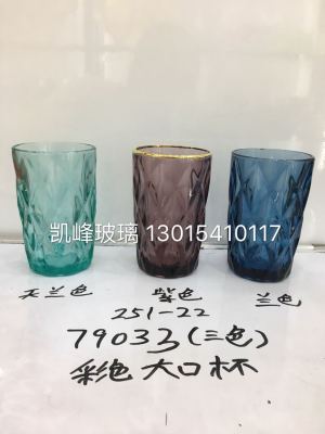 Large glass tumbler in primary colors
