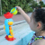 Baby bath toy boy and girl play on the beach in the bathroom and outdoors on a rhubarb duck
