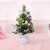 A new mini Christmas tree a small Christmas tree the Christmas table is decorated with Christmas tree decorations