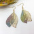 The manufacturer sells gold Leaf female style European and American style Earrings out double layer Creative Alloy Earrings