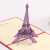 Creative hollowed-out 3D paper carvings are made to customize the valentine's gift of the Eiffel Tower.