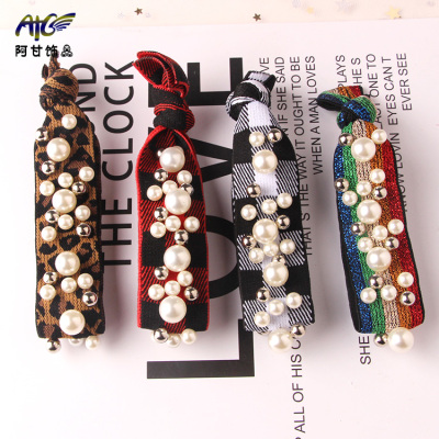 Spot hot style! South Korea leopard pearl tie knot nail bead balls first elastic hair bands