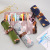 Creative binding roller curtain pen bag pen curtain multi-functional makeup brush storage bag