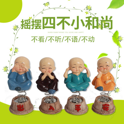 Car accessories shake head 4 monks Car cartoon spring doll 4 creative resin Car accessories