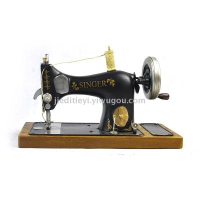 Vintage iron art sewing machine home clothing store display decorative arts and crafts decoration.