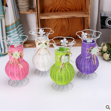 Manufacturers wholesale home tabletop tieyi woven vase manual rattan artificial landing basket flower decoration