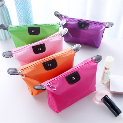 Korean version of cute dumplings makeup bag candy color folding dumplings storage bag ingot-type waterproof 