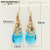 Rongyu Europe and America Cross Border Top-Selling Product Fashion Hollow Flower Earrings Micro Inlaid Zircon Sea Blue Water Drop Crystal Earrings