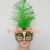 Venetian ball mask with green ostrich feather music